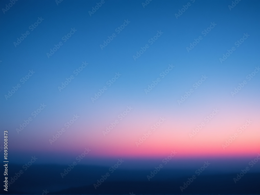 Beautiful gradient of twilight sky over distant mountains during sunset with soft hues of blue and pink Beautiful gradient of twilight sky over distant mountains during sunset with soft hues of blue and pink