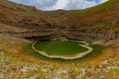 Çıralı Sinkhole is located in the Akviran Plateau in the northwest of the Yenikent District of the Karapınar District of Konya. photo