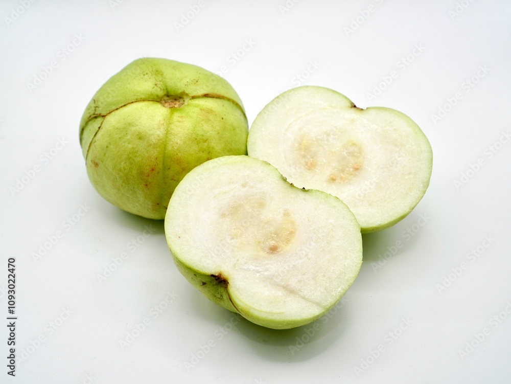 Close up image of green guavas isolated on a white background. Fresh fruit with alot of vitamin C Close up image of green guavas isolated on a white background. Fresh fruit with alot of vitamin C