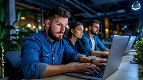 Team of Coworkers Collaborating Late at Night in Dimly Lit Office Space