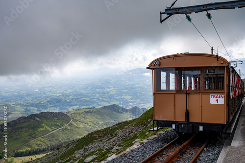 Travelling by old wooden train up to Larrun or La Rhune, Larhune mountain at the western end of the Pyrenees located on border of France and Spain, in traditional Basque provinces Labourd and Navarra photo