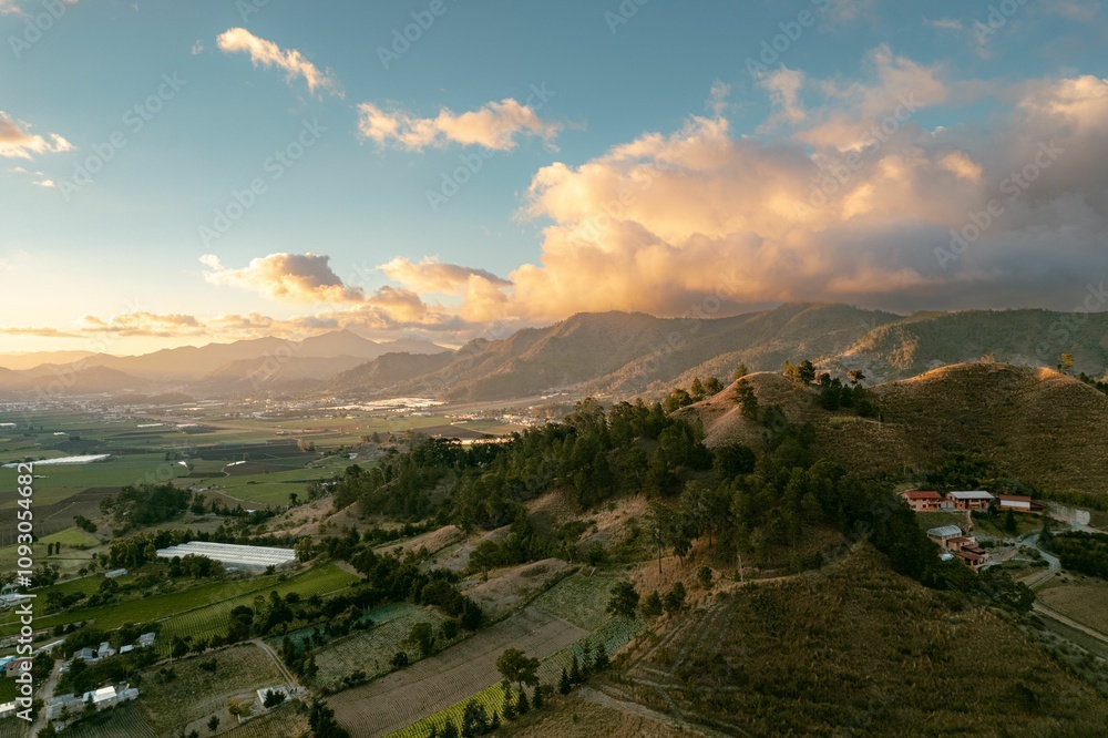 Scenic valley and mountains at sunset. Scenic valley and mountains at sunset.