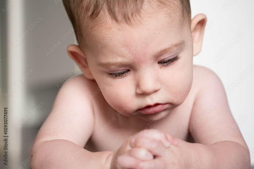 Little baby discovering his hands Little baby discovering his hands