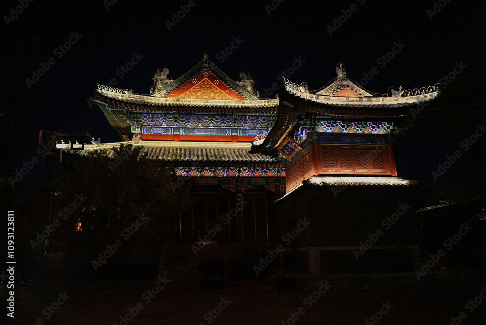 Fototapeta premium Illuminated Chinese temple at night