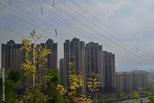 Tall buildings and power lines photo