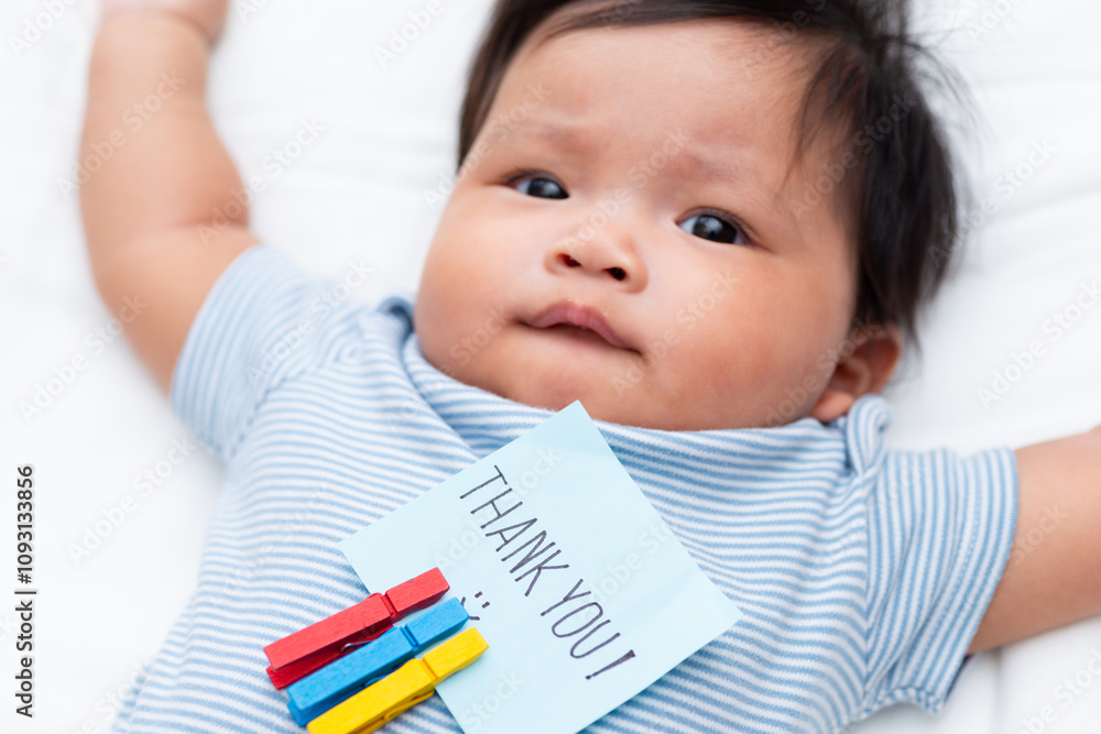 Celebrating milestones baby thank you note home family moment cozy setting close-up view business appreciation Celebrating milestones baby thank you note home family moment cozy setting close-up view business appreciation