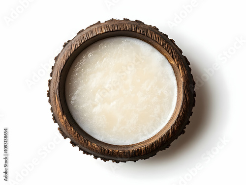 Photo Coconut Oil in Wooden Bowl, White Background photo