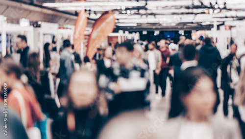 Abstract blurred people at exhibition hall of expo event trade show. Business convention show or job fair. Business concept background photo