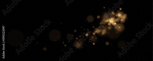 Christmas glowing bokeh. A blur of sparks and golden stars sparkle with a special light. Golden bokeh effect.