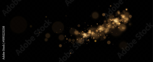 Christmas glowing bokeh. A blur of sparks and golden stars sparkle with a special light. Golden bokeh effect.