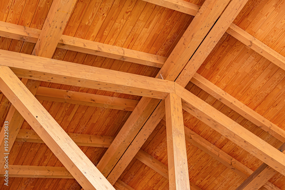 Construction of a wooden roof of a frame house.