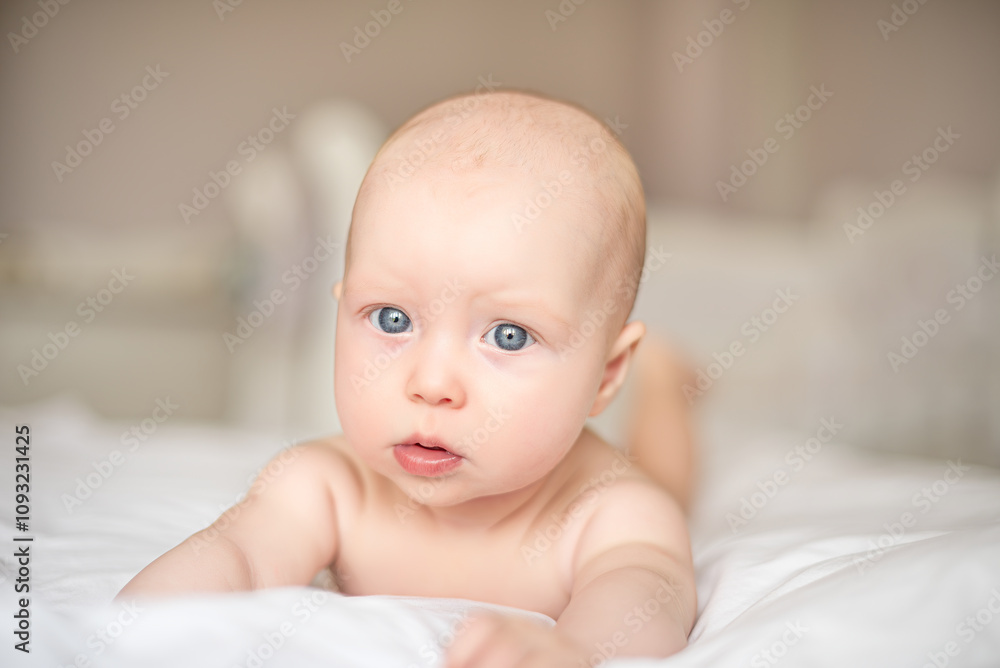 Baby girl with blue eyes close-up. Baby girl with blue eyes close-up.