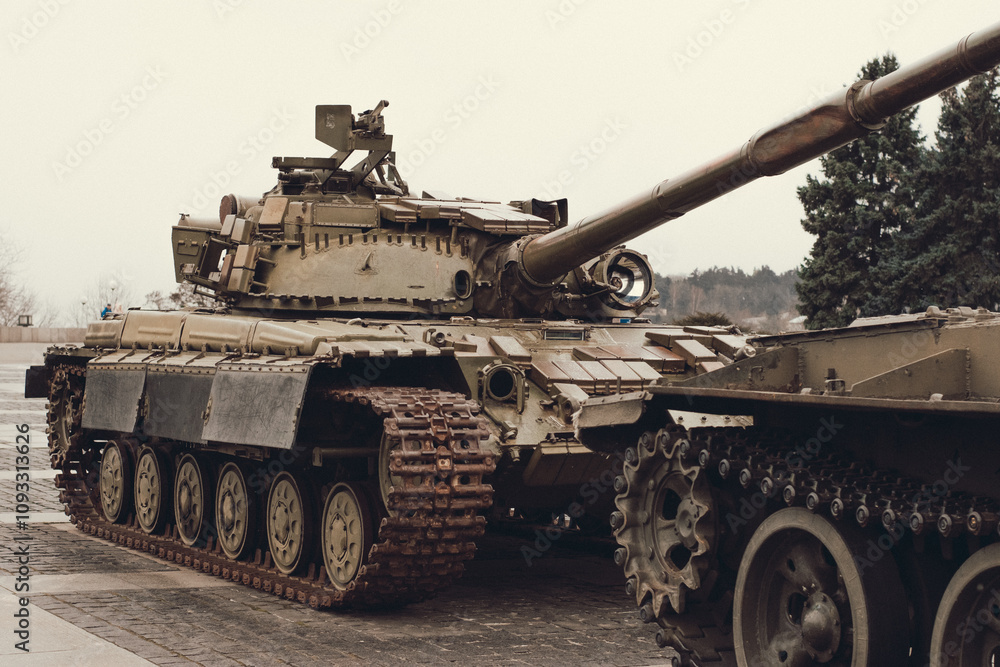 Military Tank in Outdoor Setting Military Tank in Outdoor Setting