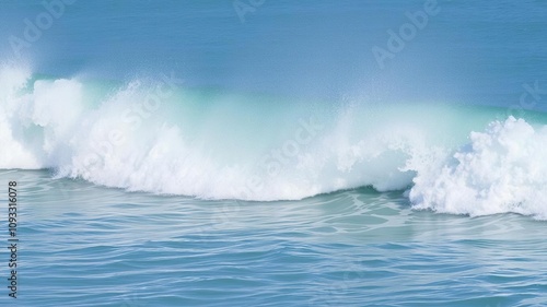 A large wave of emerald green water crashing against the shore in a coastal area with crashing surf and foamy waves, coastline, foam