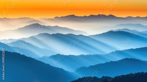 Majestic Sunrise Over Layered Blue Mountains