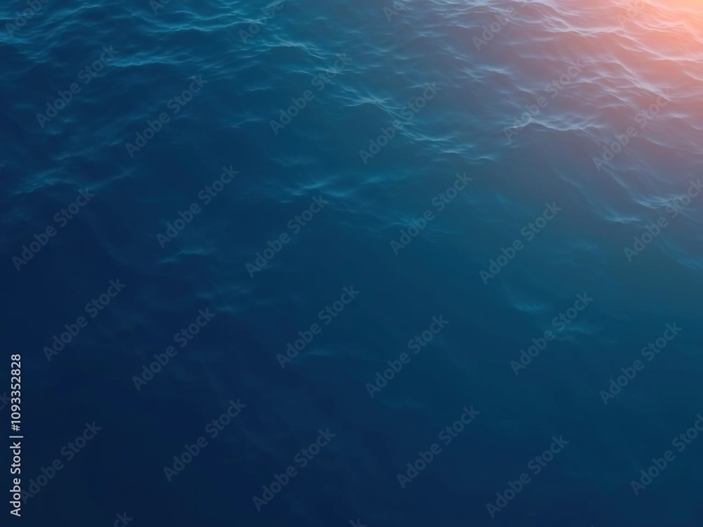 Deep blue ocean surface with subtle wave ripples and soft sunlight filtering down, blue hue, ocean waves, calm water