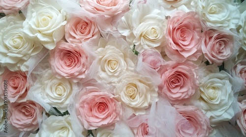 Delicate Arrangement of Soft Pink and White Roses Surrounded by Ethereal Tulle for a Romantic Floral Display