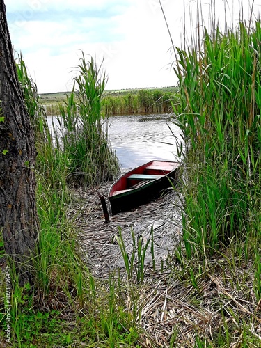 Lonely boat on the lake photo