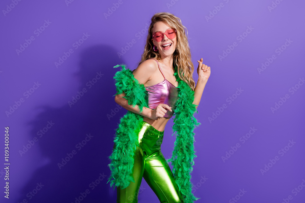 Youthful woman in vibrant retro outfit exudes happiness against a violet background at a disco party Youthful woman in vibrant retro outfit exudes happiness against a violet background at a disco party
