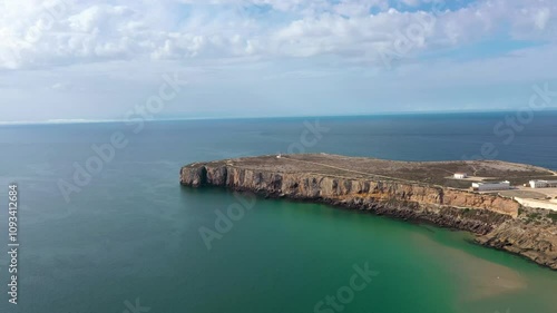 Wallpaper Mural Aerial view of Sagres Cape. View of Sagres Lighthouse, at left. Sagers Fortress at right side. Famous travel destination in Algarve Region, South of Portugal. High cliffs. Drone panning right. Torontodigital.ca