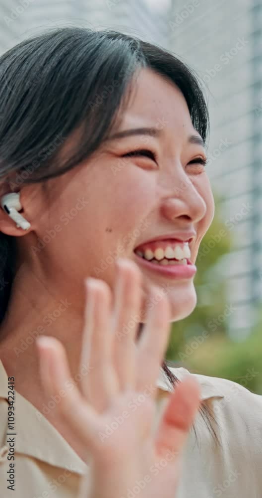 Woman, happy and waving on video call with earphones in city for blog, live streaming and talking. Smile, hello and girl recording with hand gesture for greeting or Japanese influencer welcome fans