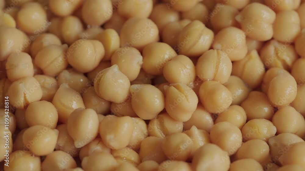 Pile of chickpeas background rotating macro. Pile of chickpeas background rotating macro.