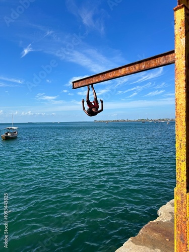 child diving in the sea