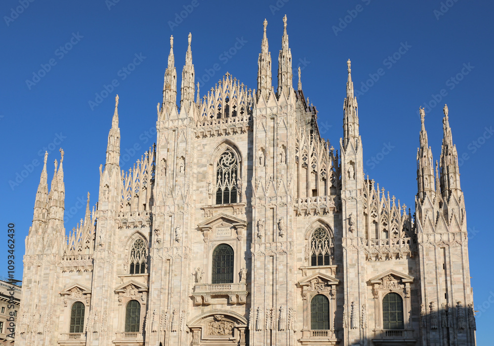 Gothic facade of Cathedral of Milan in Northern Italy called DUOMO DI MILANO Gothic facade of Cathedral of Milan in Northern Italy called DUOMO DI MILANO