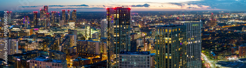 Panoramic aerial image of Manchester cityscape over Trinity way at twilight 