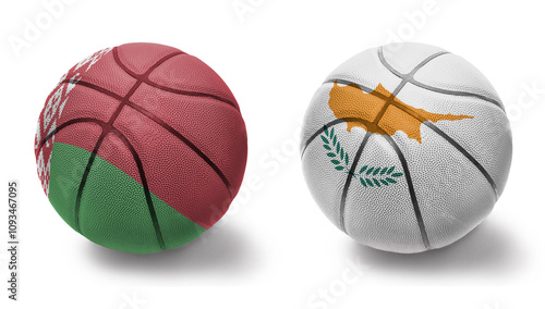 basketball balls with the national flags of cyprus and belarus on the white background. photo