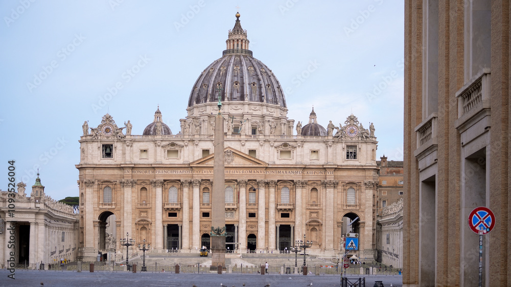 Obraz premium A magnificent view of St. Peter Basilica in Vatican City, showcasing its iconic dome, intricate facade, and timeless beauty.