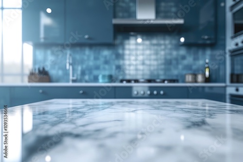 A modern kitchen with a marble countertop and blue cabinets, great for cooking and entertaining photo