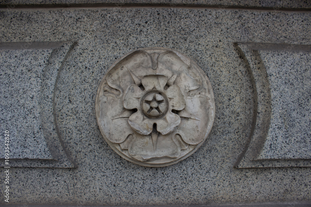 part of the decor, in the form of a flower, made of concrete. Antique building. part of the decor, in the form of a flower, made of concrete. Antique building.