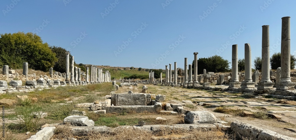 The main street with fountain in the ancient city of Perge Ruins in Turkey