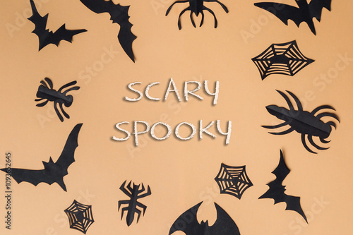 Halloween themed image with bats and spiders photo