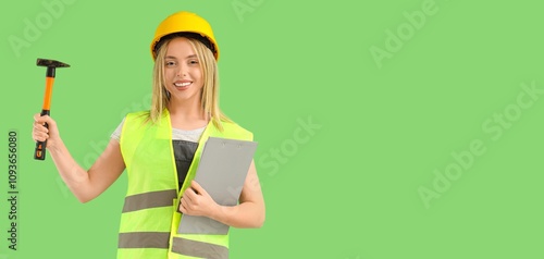 Female worker with hammer a...