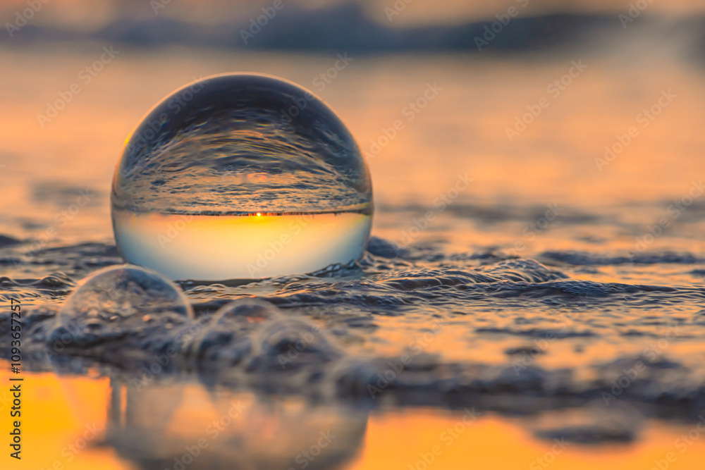 Glass ball on the beach Glass ball on the beach