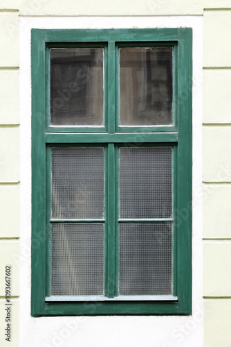 View of building with green...
