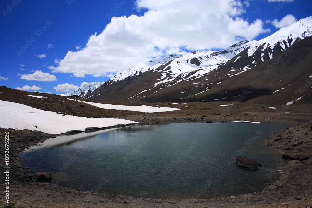 Naklejka premium An alpine lake of Baroghil valley during summer in Pakistan