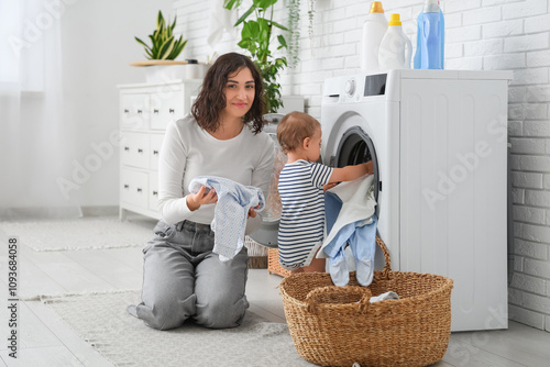 Young mother and her cute l...