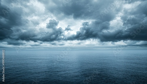 Dark Storm Clouds Above a Still Ocean