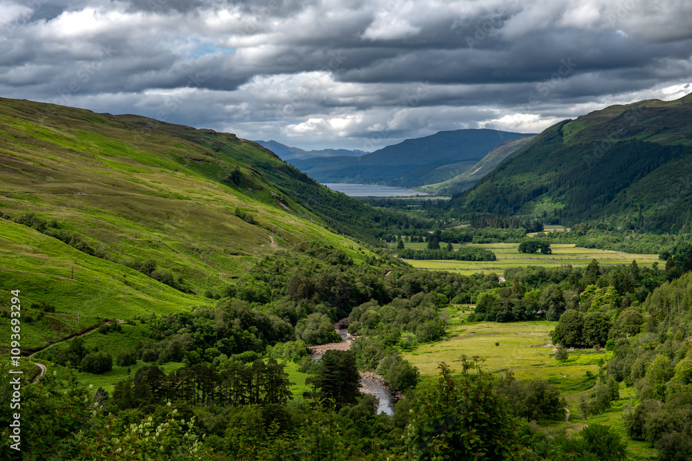 Obraz premium Corrieshalloch Gorge National Nature Reserve With River Through Pasture Valley And Loch Broom In Scotland, UK