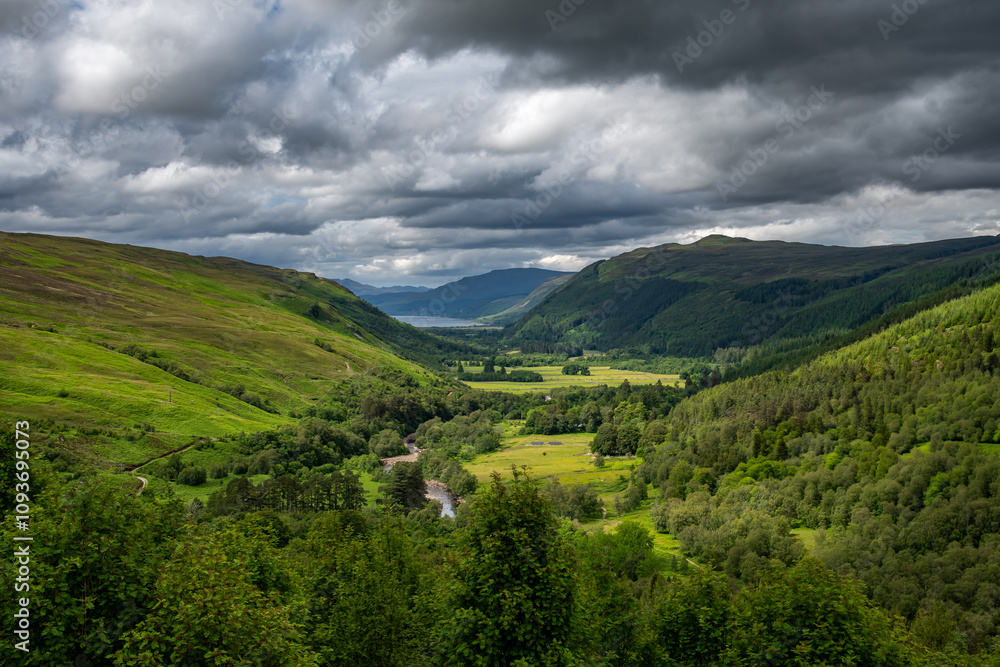 Obraz premium Corrieshalloch Gorge National Nature Reserve With River Through Pasture Valley And Loch Broom In Scotland, UK