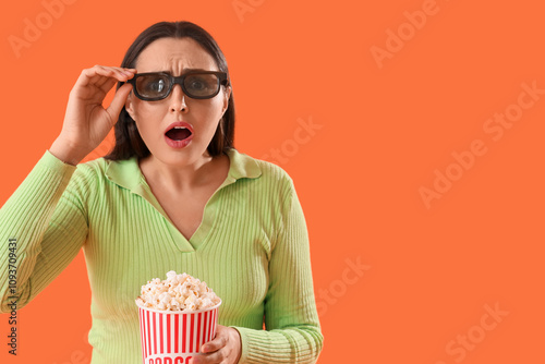 Shocked young woman in 3D g...