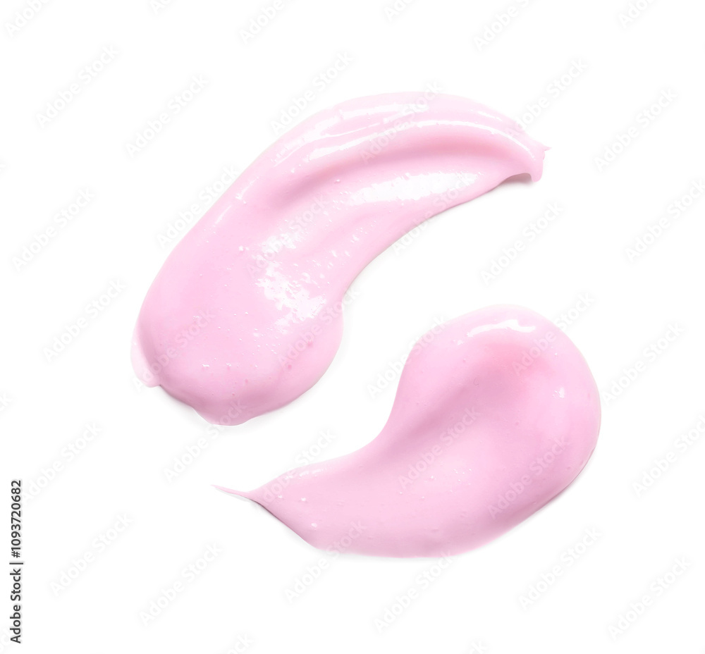 Smears of pink cosmetic cream on white background Smears of pink cosmetic cream on white background