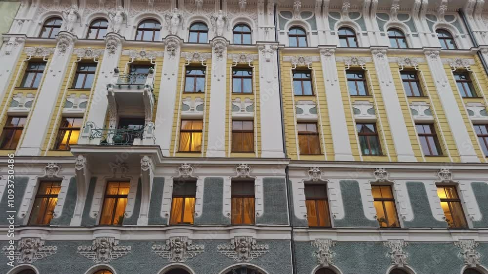 An Elegant Historical Building Facade, Beautifully Illuminated at Dusk within a Busy Urban Environment An Elegant Historical Building Facade, Beautifully Illuminated at Dusk within a Busy Urban Environment