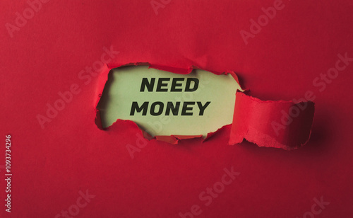 Red background with a torn piece of paper with the word NEED MONEY written on it