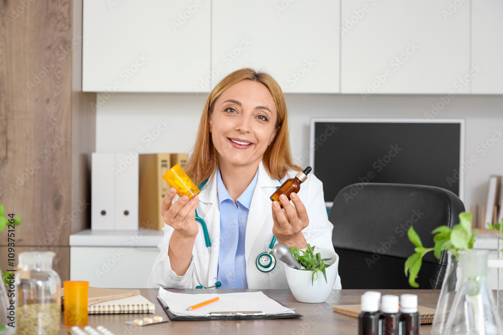 Female homeopathic doctor with natural remedy at table in office Female homeopathic doctor with natural remedy at table in office