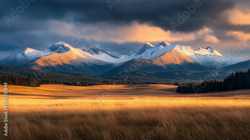 Snowy mountain landscape.  Tatra Mountains in Poland during sunset, with the snow-capped peaks and valleys.