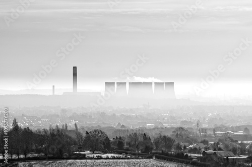 Distant power station in mist photo